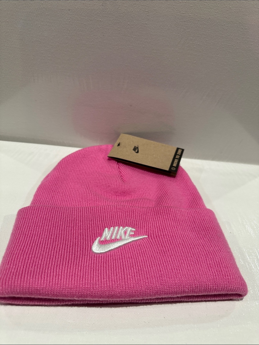 Nike Unisex Hot Pink Beanie made with 75% recycled material.